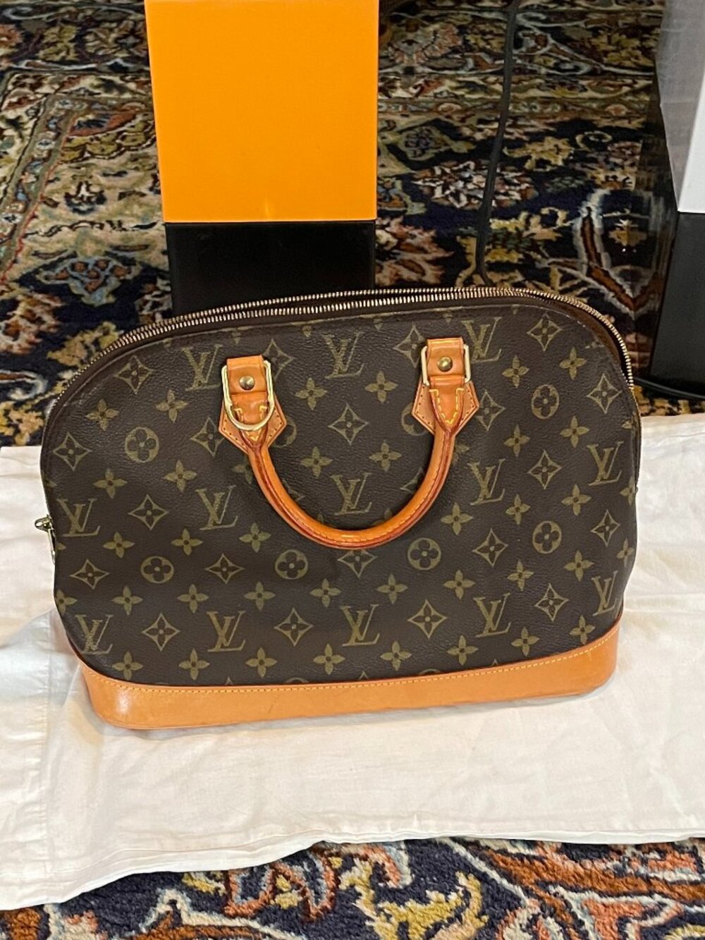 Classic Louis Vuitton Alma PM in the iconic Monogram canvas